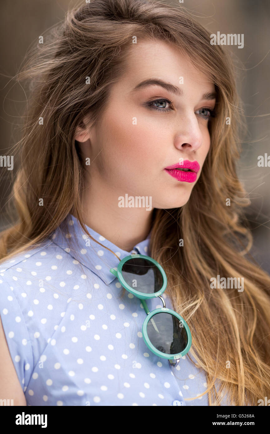 Portrait of a beautiful young woman with long hair Stock Photo - Alamy