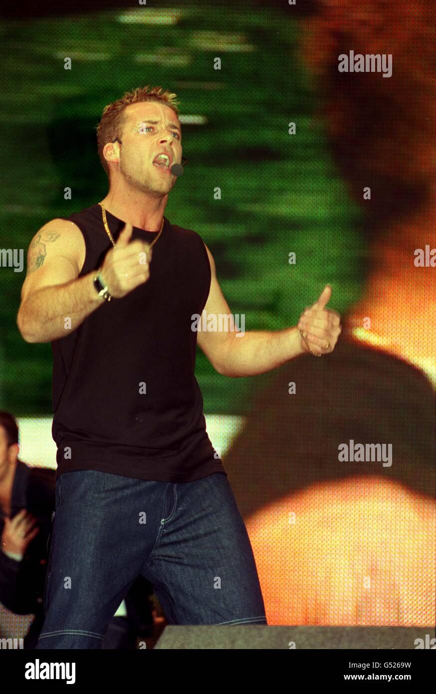 J Brown (Jason Brown) from the boy band Five performing on stage at the Mardi Gras 2000 festival in London's Finsbury Park. Stock Photo