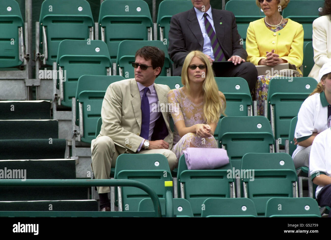 Model Claudia Schiffer and Fiance Tim Jeffries watching the tennis during the Duke of York's NSPCC Tennis Challenge at Buckingham Palace. Stock Photo