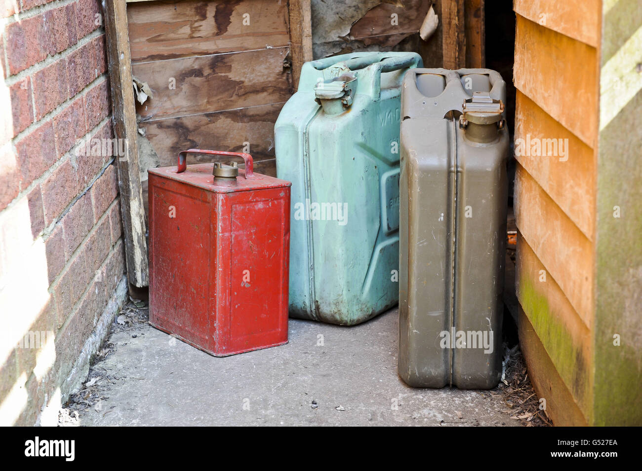 A general view of metal jerry cans and fuel containers beside a garden shed in Bristol, after sales of petrol and diesel increased dramatically yesterday as motorists flocked to garages to fill up following controversial advice from the Government ahead of a possible strike by fuel tanker drivers. Stock Photo