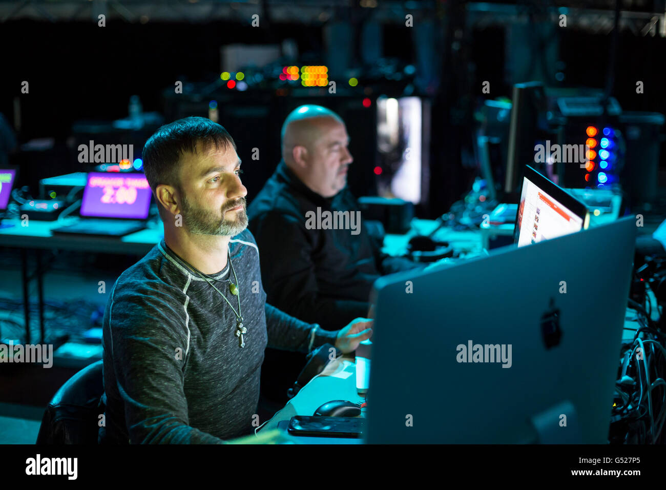 Detroit, Michigan - Workers operate audio and visual equipment backstage at the convention of the Service Employees union. Stock Photo