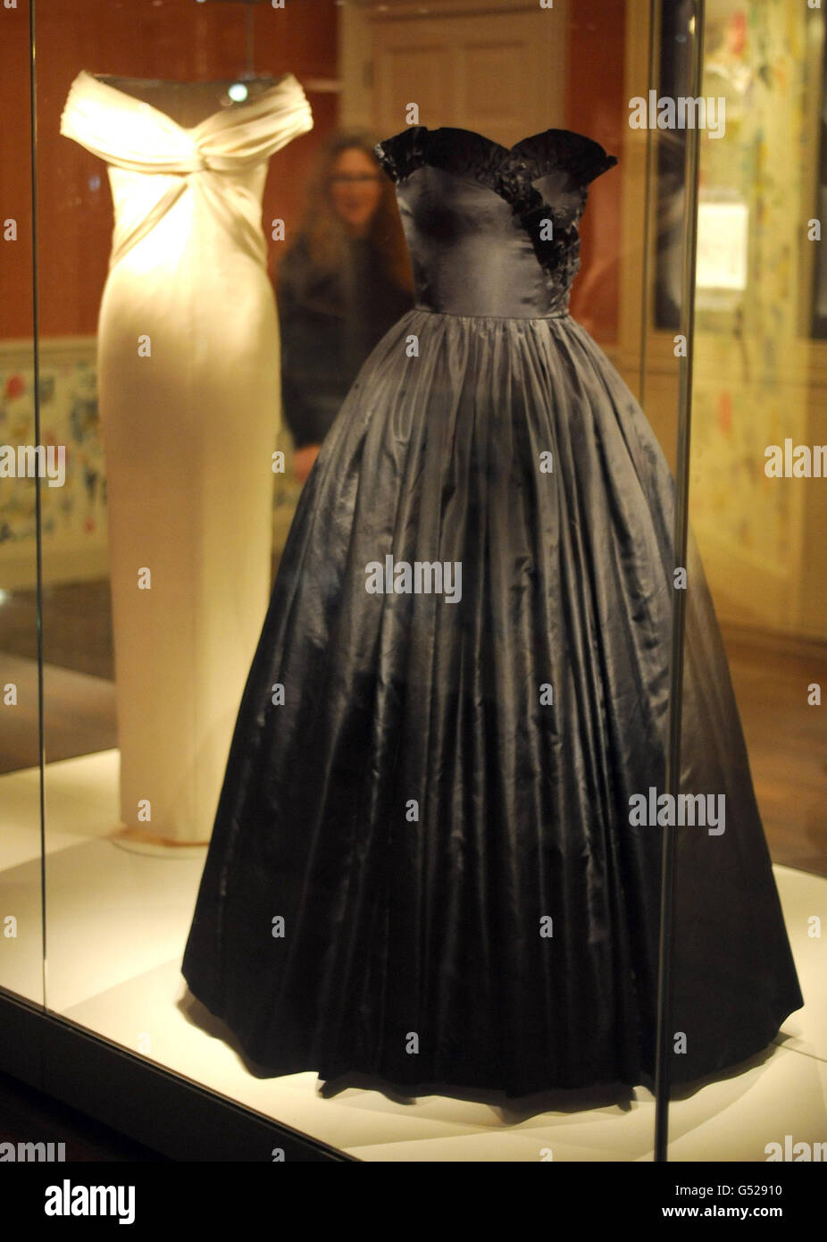 Two of Princess Diana's dresses, a classic formal dinner dress by ...