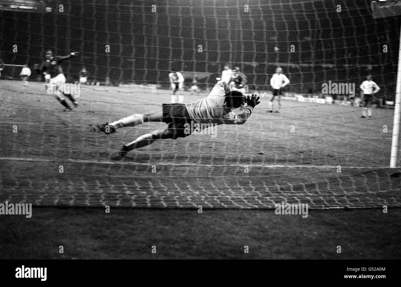 Gordon Banks, the England goalkeeper in a brilliant effort to stop a penalty shot from West Germany's Gunter Netzer in the 1971 European Championshp quarter-final (second leg) which Germany won 3-1. Stock Photo
