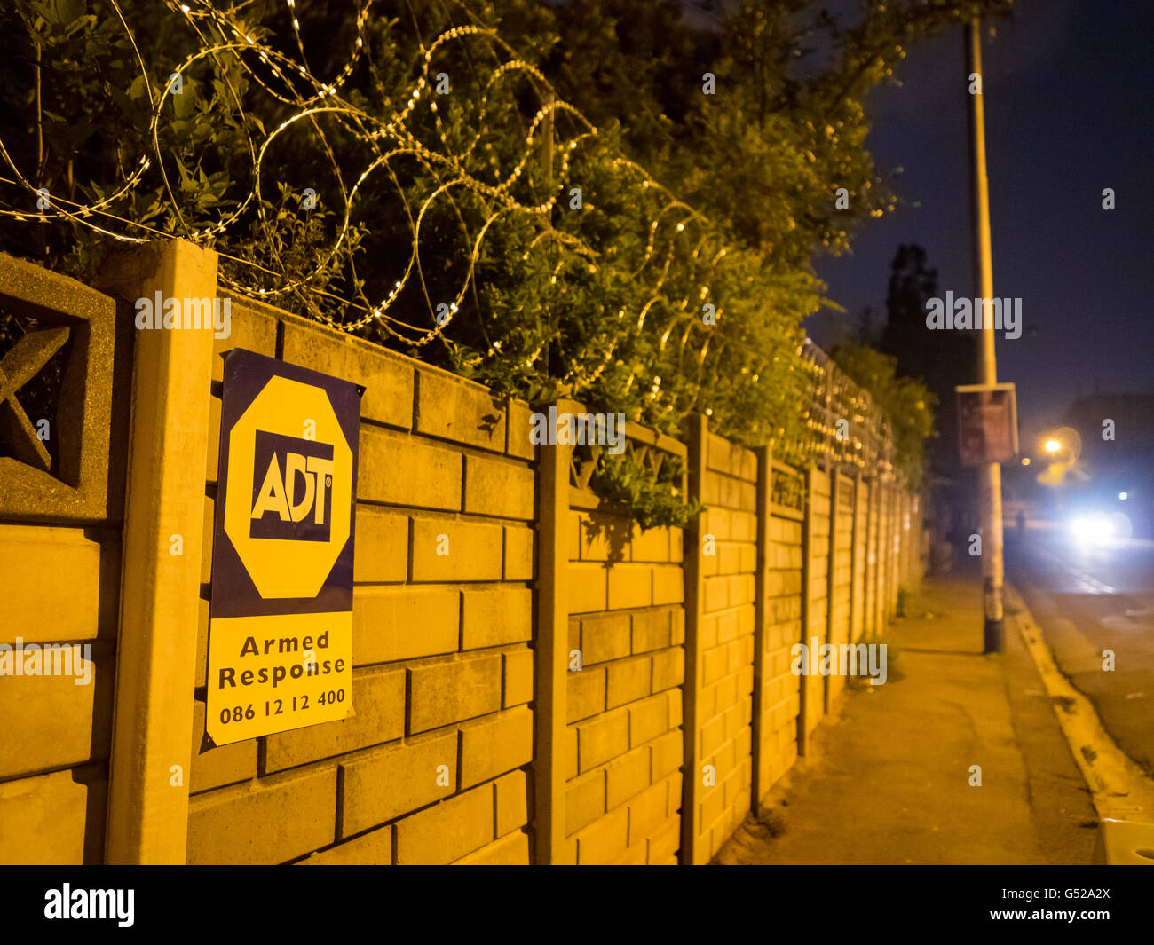 South Africa Gauteng Johannesburg Stone Wall Fence With Barbed Wire south-africa-gauteng-johannesburg-stone-wall-fence-with-barbed-wire