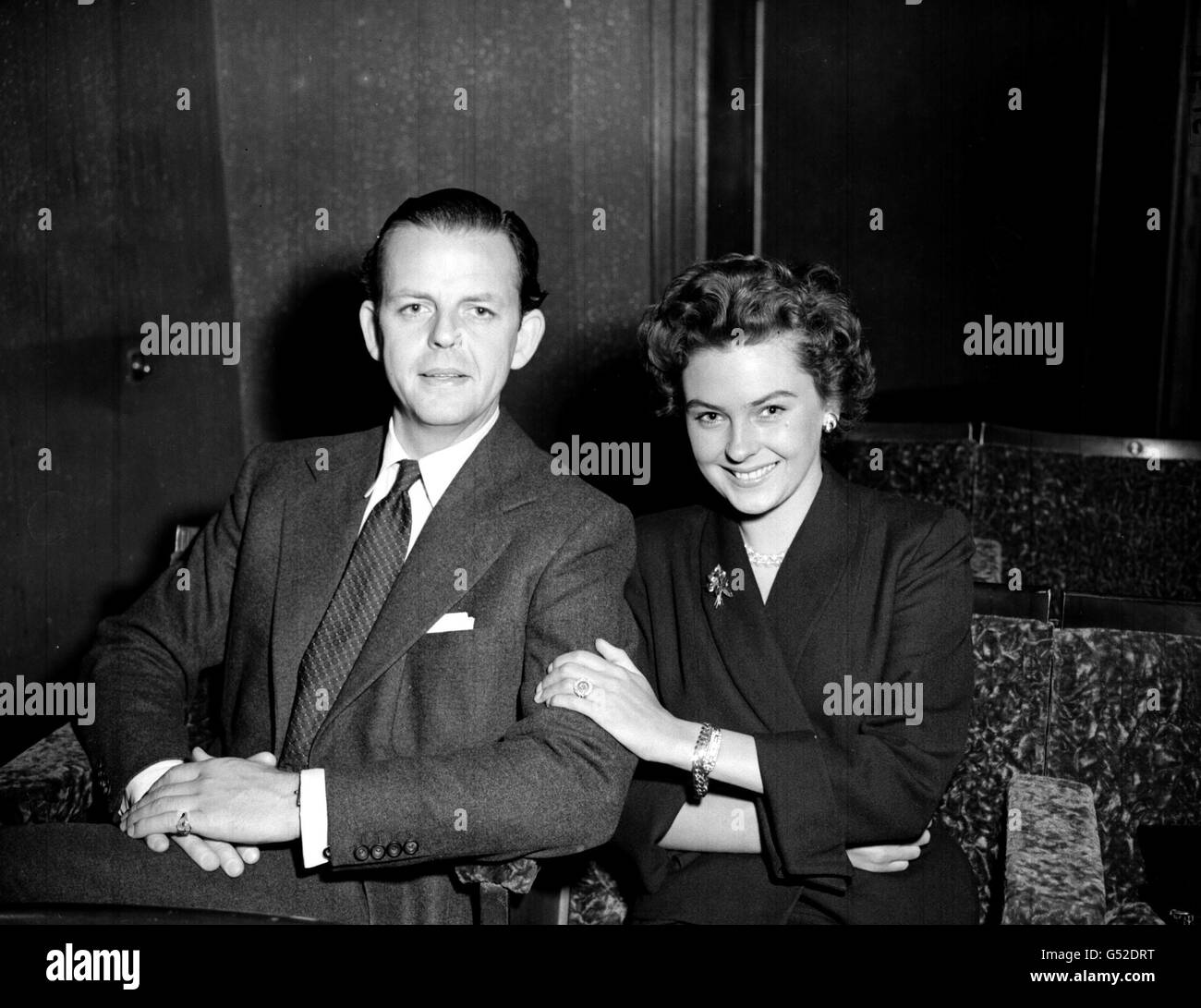 David Tomlinson and Jill Clifford at the Lyric Theatre in London after the announcement of their engagement Stock Photo