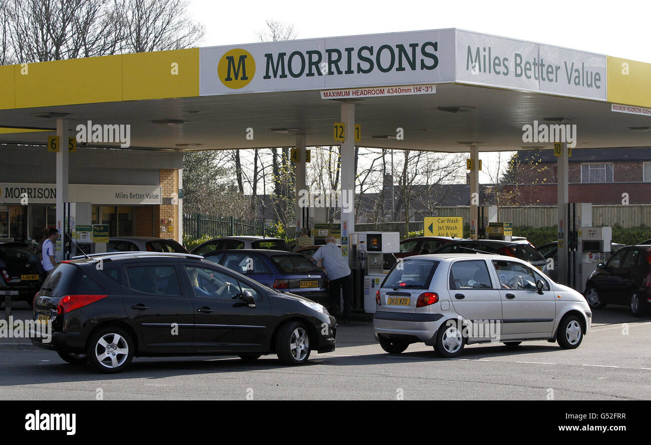 People queue to buy petrol at Morrisons petrol station in Belle Vale