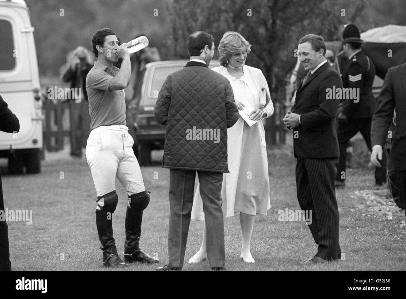 Fresh from the formality of the first day of Royal Ascot, the Prince and Princess of Wales went onto Windsor where the bottle-swigging Prince was playing Polo. The Princess still wears the sugar-pink outfit, minus millinery, she wore at the races. Stock Photo