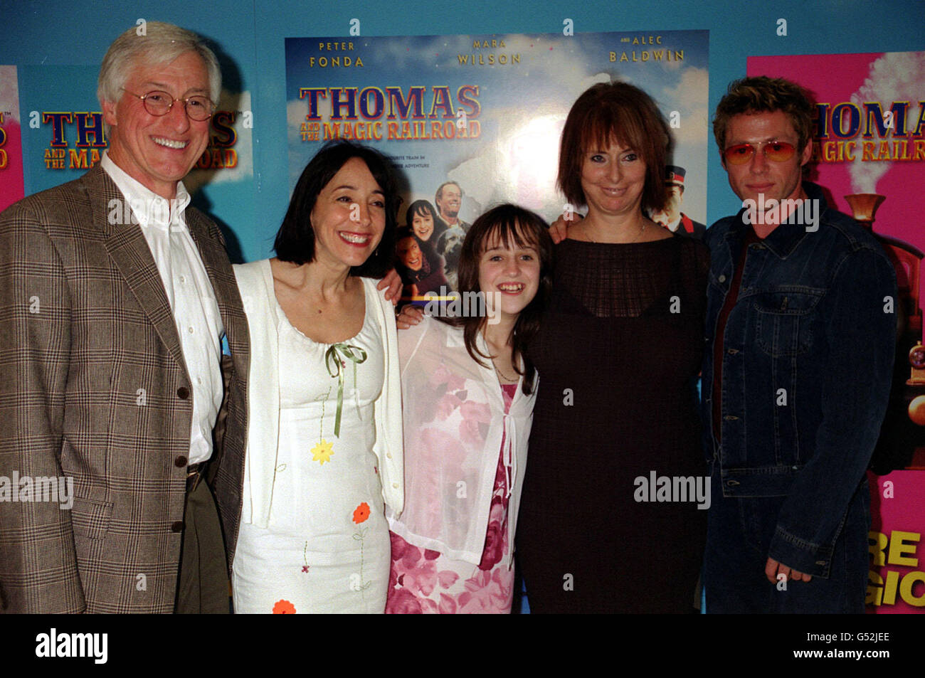 Stars of the film at the world charity premiere of Thomas and the Magic Railroad. Actress Didi Conn (2nd L), Mara Wilson (centre), producer, writer and director Britt Allcroft, and actor Michael Rodgers (R), at the Odeon cinema, in London's Leicester Square. Stock Photo