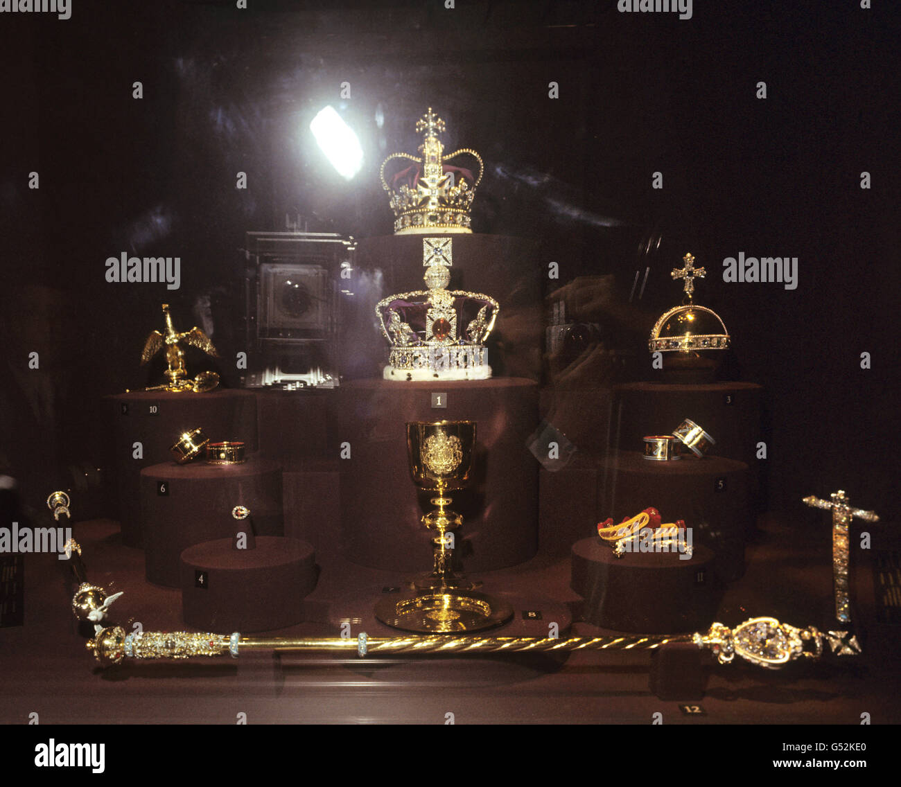 The Imperial State Crown, St. Edwards Crown, the Sovereign Orb, The Golden Spurs, Bracelets and the Jewel Sword of State are alll exhibited at the new Crown Jewel Imperial House at The Tower of London. Stock Photo