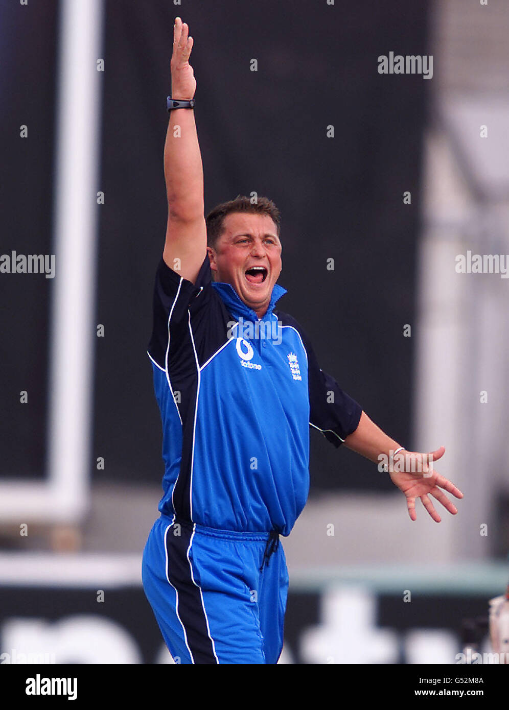 England bowler Darren Gough celebrates after dismissing Zimbabwe's Guy ...