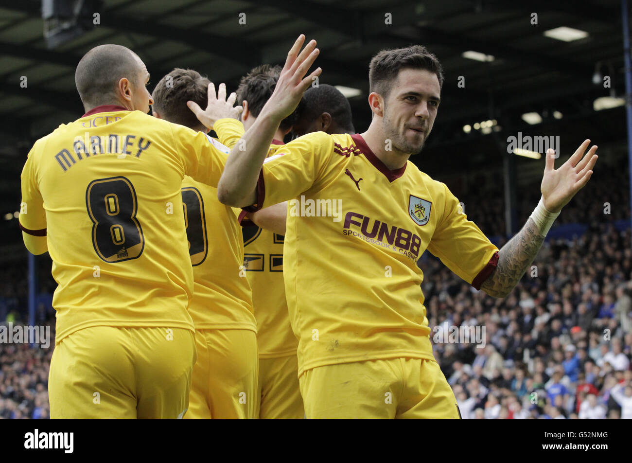 Burnley's Danny Ings (right) celebrates team mate Charlie Austin's goal during the npower Football League Championship match at Fratton Park, Portsmouth. Stock Photo
