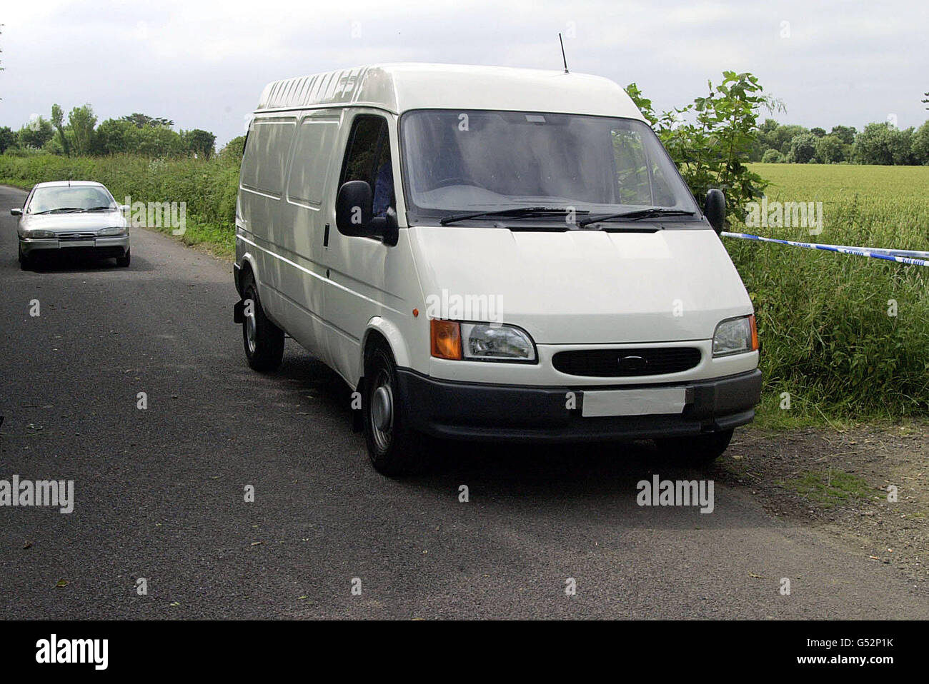 A White Transit (that police wish to trace), during a reconstruction. similar to the van seen at the sight where 8-year-old Sarah Payne disappeared six days ago in wheat fields near East Preston, West Sussex. * Sarah's exhausted parents Sara and Michael, both 31, said they had been helped through their torment by moving messages of hope sent to them by local schoolchildren. See PA story MISSING Girl. PA photo: Tim Ockenden. Stock Photo