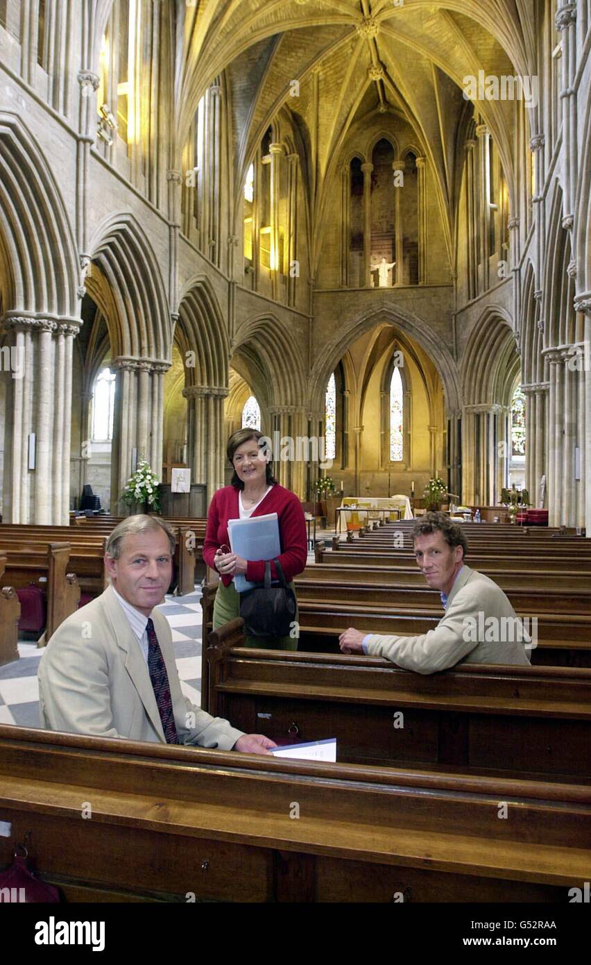 Objectors to the removal the Pershore Abbey's pews (L-R) John Alexander, Susan Kottler and Charles Hudson during a break in court proceedings at the abbey in Worcestershire. * The Church of England Consistory Court is aiming to settle a dispute over whether the historic abbey should provide worshippers with pews, chairs or a mixture of both. Stock Photo