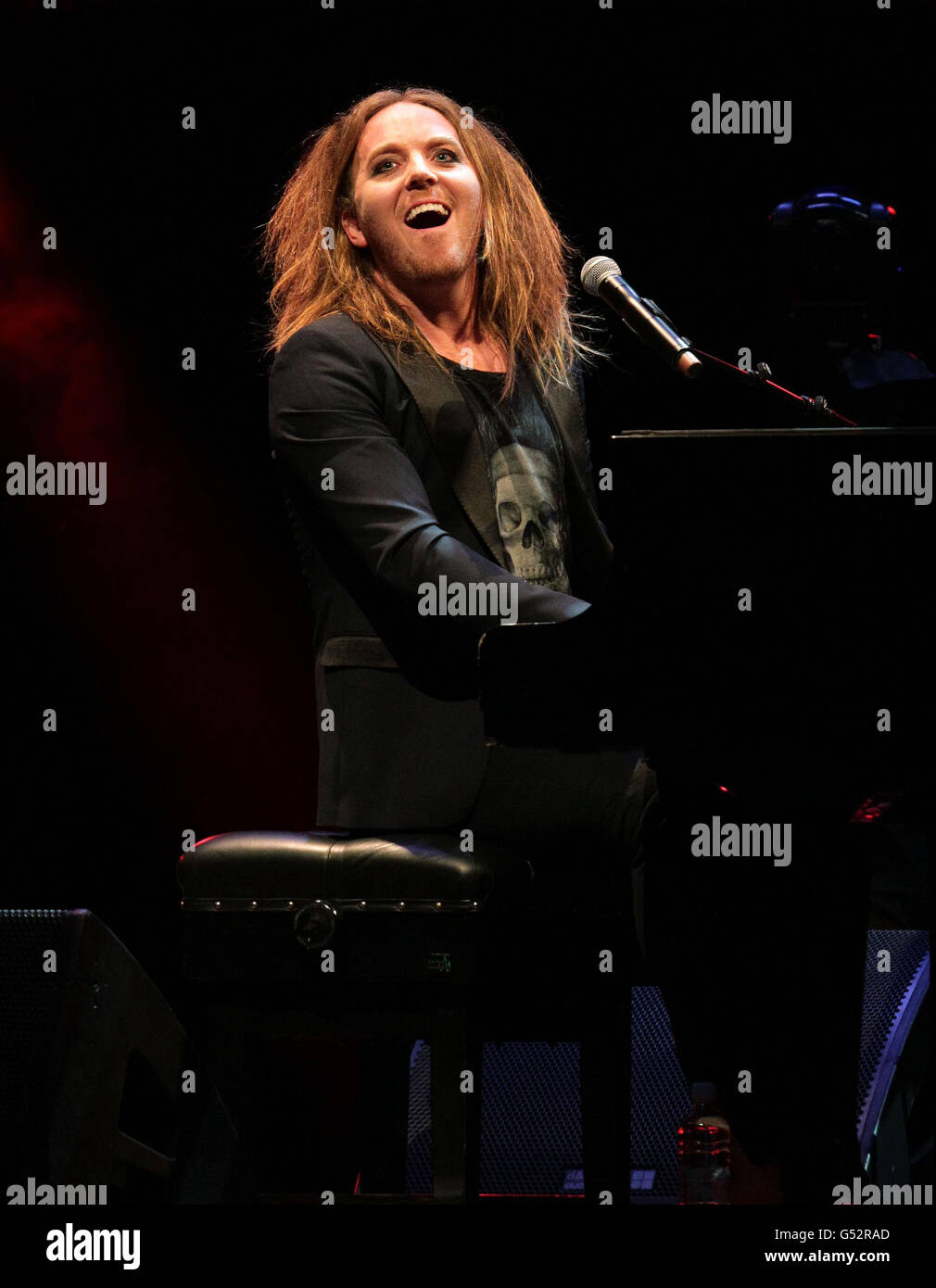 Teenage Cancer Trust evening of comedy - London. Tim Minchin on stage during the Teenage Cancer Trust Comedy Night, at the Royal Albert Hall in west London. Stock Photo