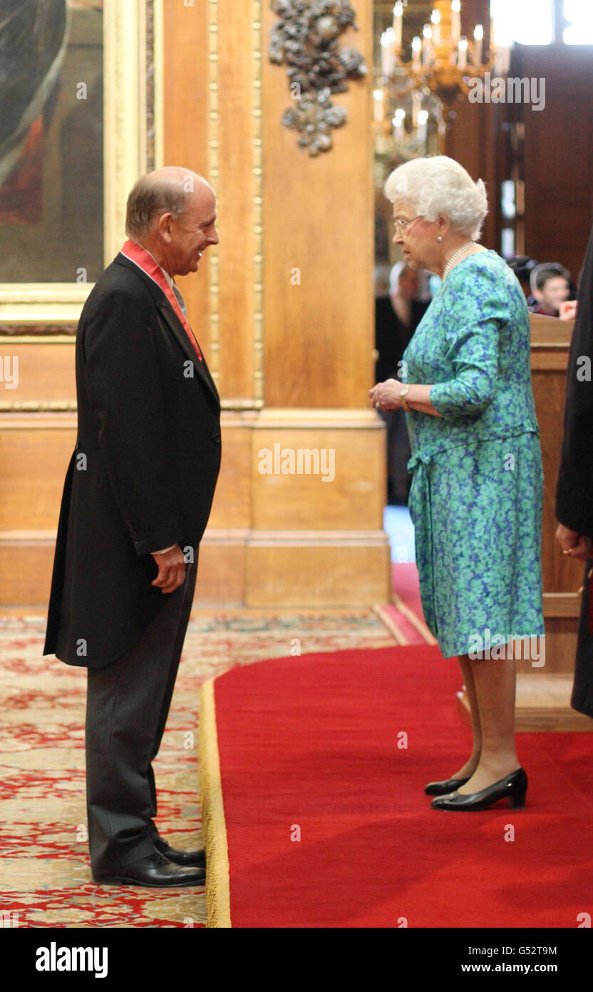 Paul Smith from Guildford is made a CBE by Queen Elizabeth II during an