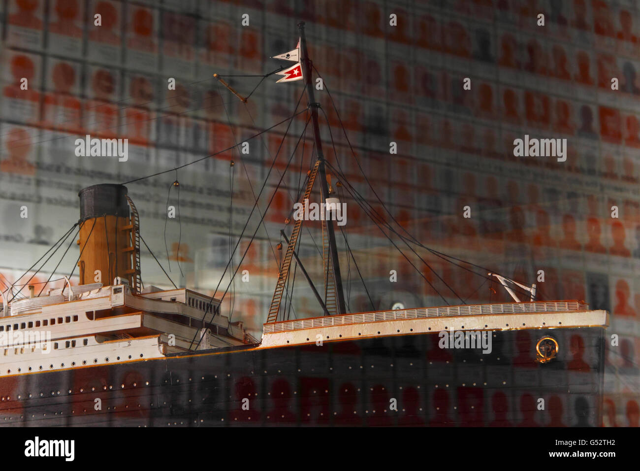 Silhouettes of victims of the Titanic disaster are reflected in the