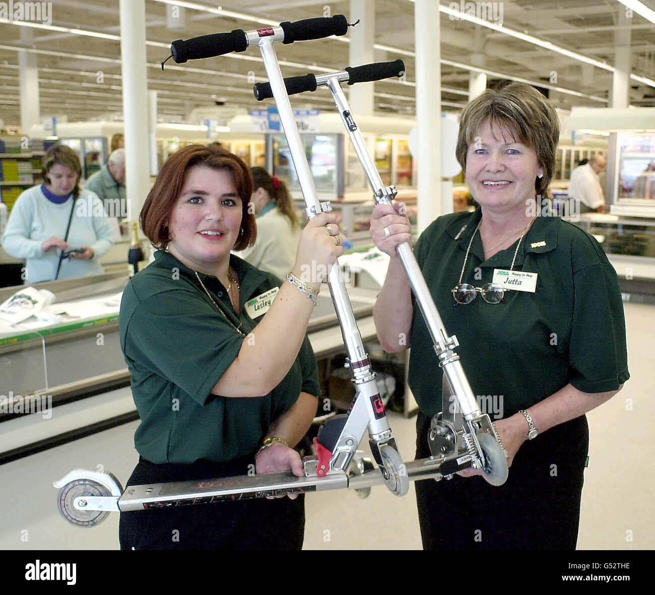 Store assistants Lesley Dring (L) and Jutta Bowen, who have been issued