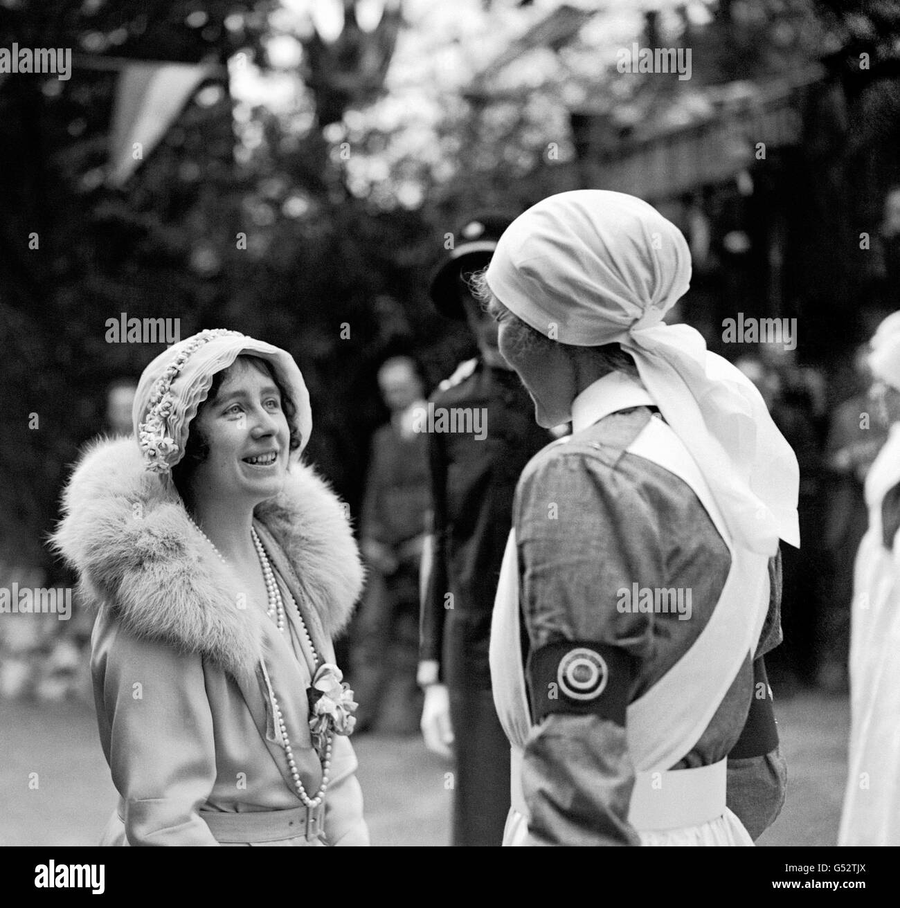 The Duchess of York (later the Queen Mother) talking to a nurse at Harrow Hospital. Stock Photo
