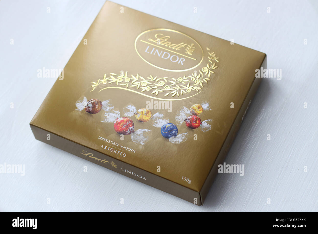 Close up of Assorted Lindt Lindor Chocolates in gold colour box Stock