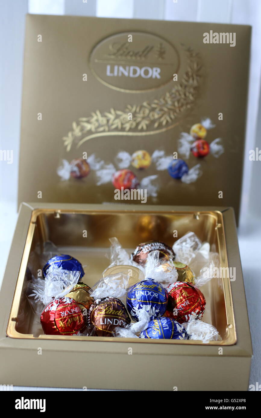 Close up of Assorted Lindt Lindor Chocolates in gold colour box Stock