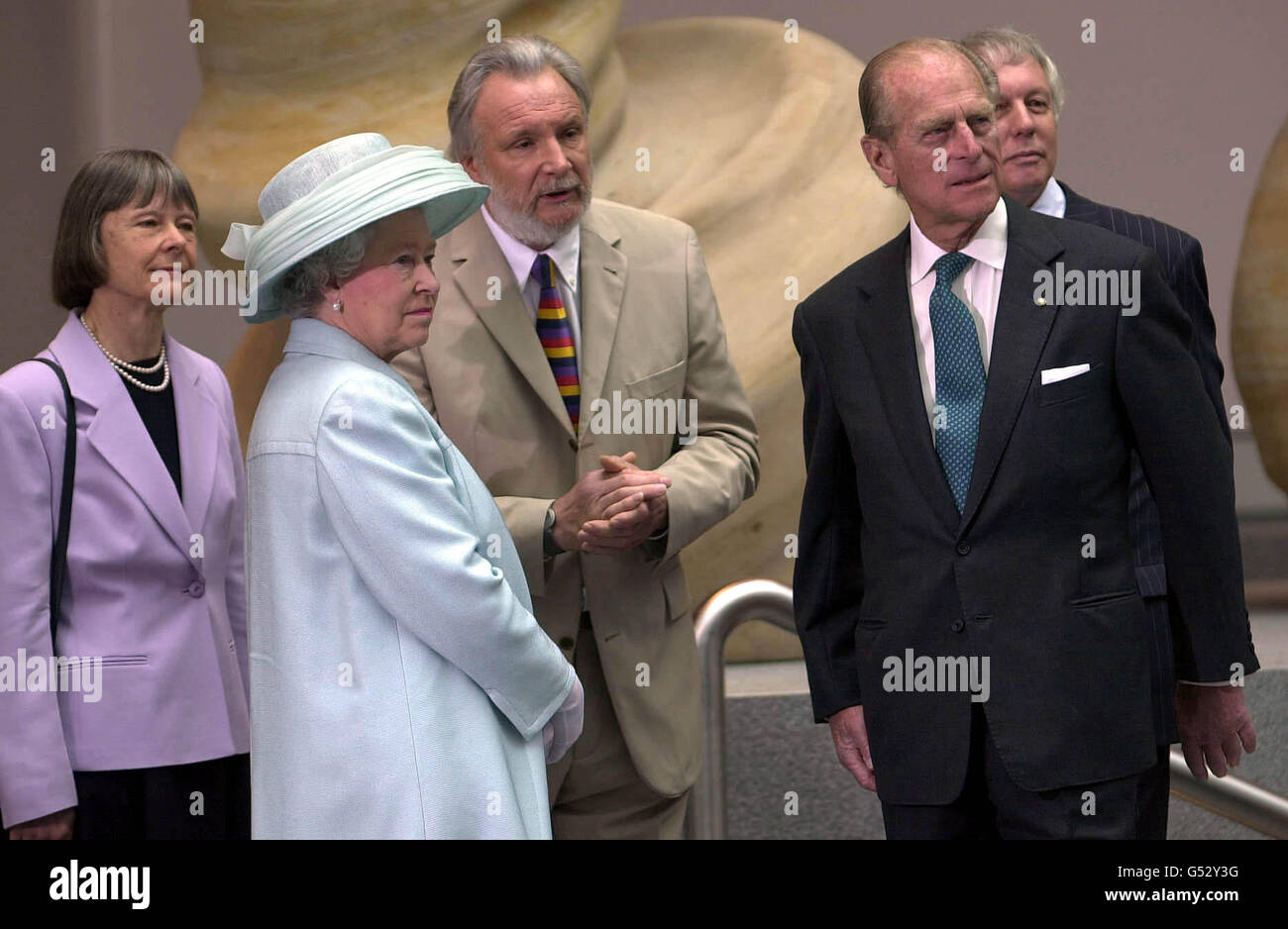 Queen Elizabeth II and the Duke of Edinburgh talks to Michael Wilford, centre, the architect of the new British Embassy in Berlin, Germany which she officially opened. Stock Photo