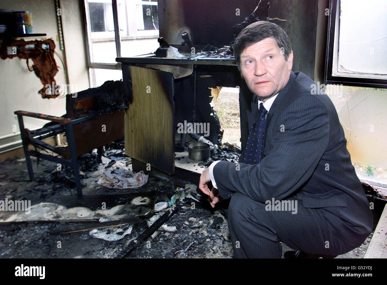 Ulster Unionist Councillor and Mayor of Ballymena James Currie at the scene of the latest arson attack in Ballymena. Mr Currie visited Saint Patrick's Catholic School on the town's Broughshane road which was attacked. * The fire was contained to a staff room but a number of classrooms suffered smoke damage. A Catholic church in Harryville escaped serious damage after a fire also burned it self out. Stock Photo