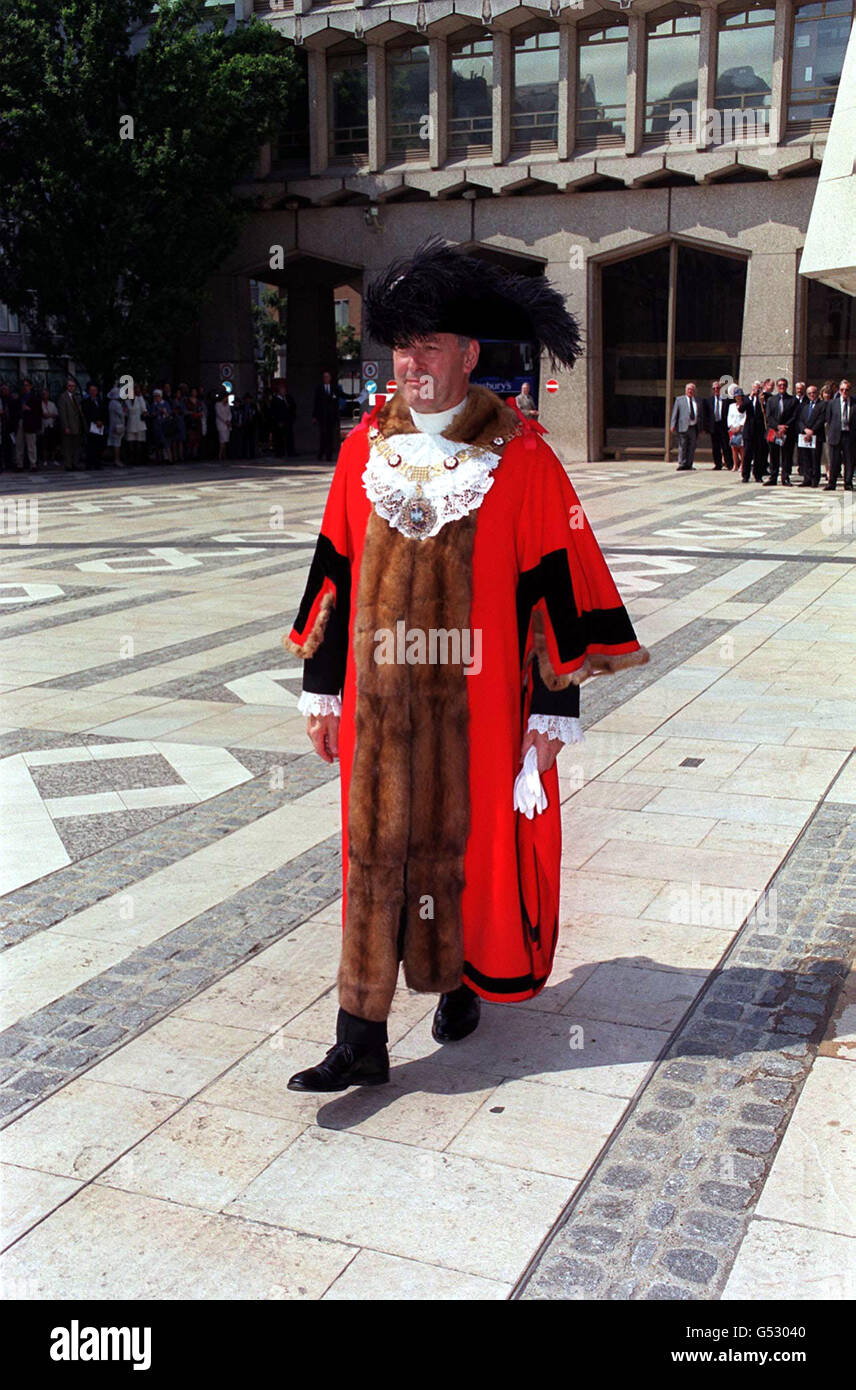 The 672nd Lord Mayor of the City of London, Alderman Clive Martin at the annual cart marking ceremony in Guildhall Yard, London. The Mayor is embossing the City Arms and a year letter onto vehicles at the ceremony. Stock Photo