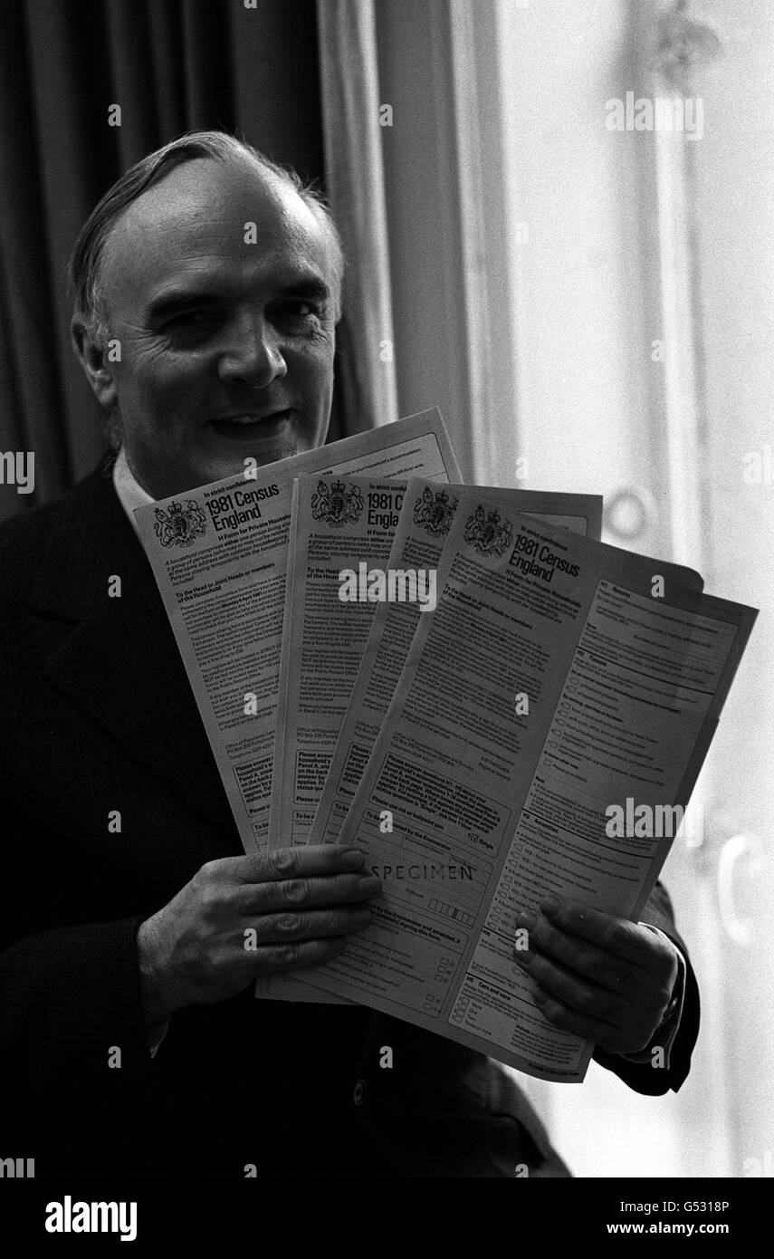 The Registrar General for England and Wales, Mr Roger Thatcher, and some specimen forms for the 1981 census in his Kingsway office, London. Stock Photo