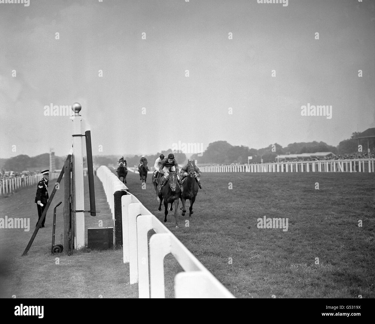 The Queen's 'Aiming High' (l), with jockey Lester Piggott up, manages ...