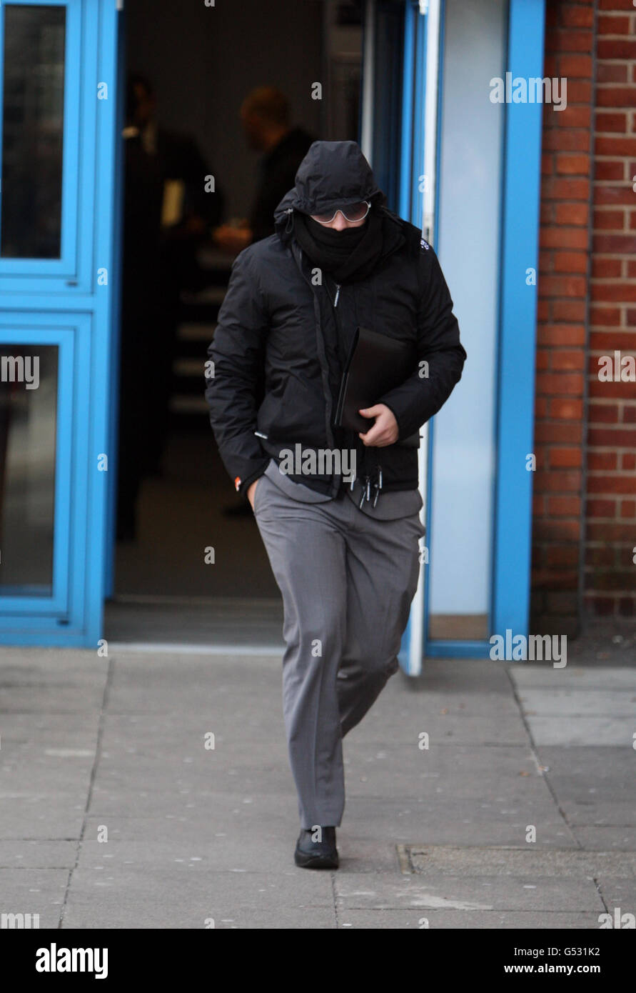 Matthew Davis, 22, from Crawley, West Sussex, leaves his committal hearing at Uxbridge Magistrates' Court for communicating a bomb threat. Mr Davis was on the Tokyo to London flight with 150 passengers on board on February 12 when it is alleged he scrawled a message on a toilet door that caused the scare. Davis was then arrested when the Boeing 777 landed at Heathrow Airport. Stock Photo