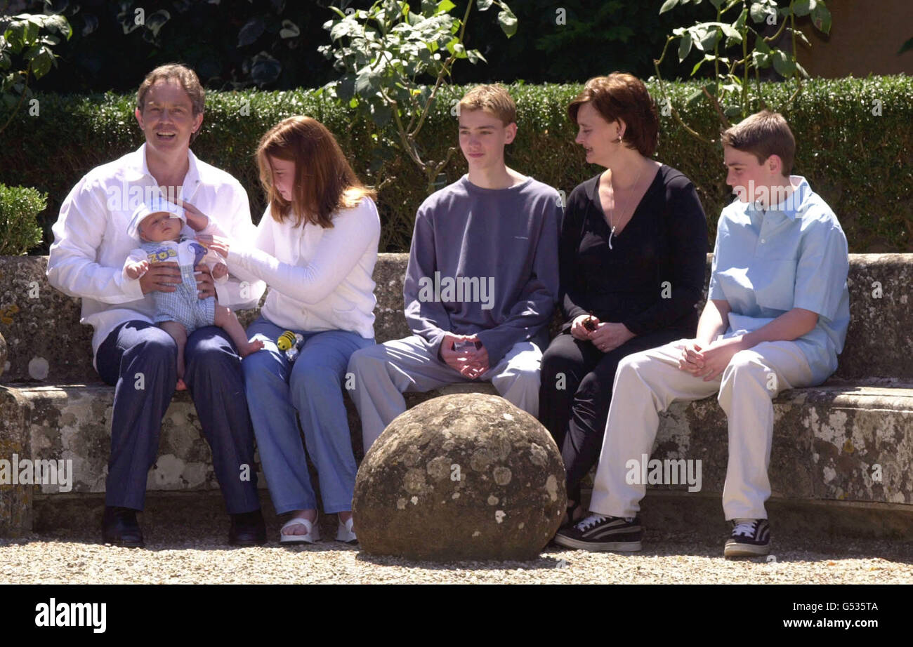 From left to right Britain's Prime Minister Tony Blair with baby Leo