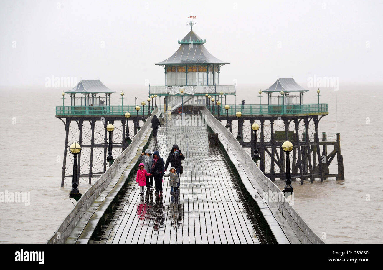 Spring weather Apr 9. People on the Victorian Pier at Clevedon, Somerset. Stock Photo