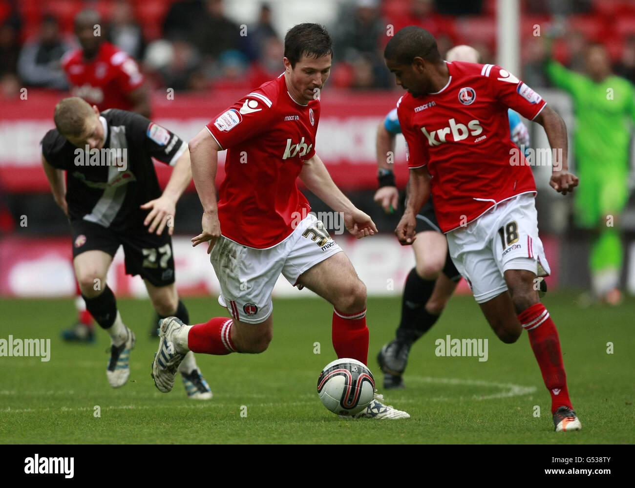 Charlton Athletic's Yann Kermorgant (centre) in action during the npower Football League One match at The Valley, London. Stock Photo