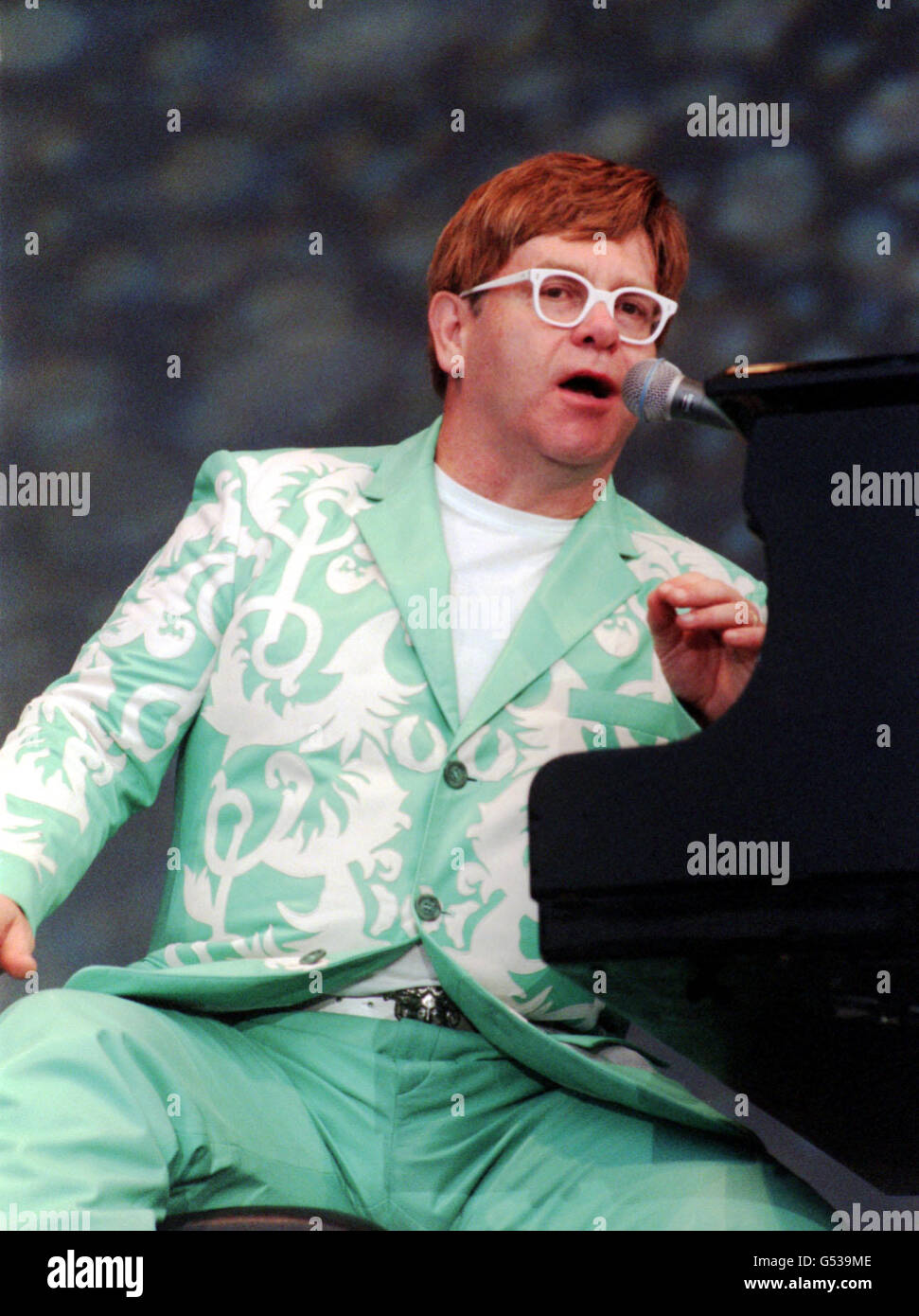 Sir Elton John performing on stage at the Route of Kings concert in Hyde Park, London. Stock Photo