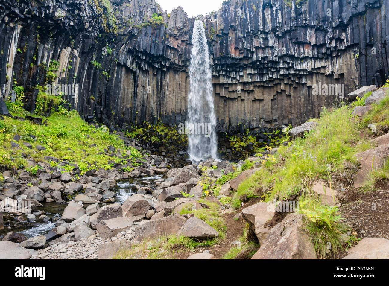 Iceland, Svinafellsjokulsvegur glacier, quarry with waterfall Stock