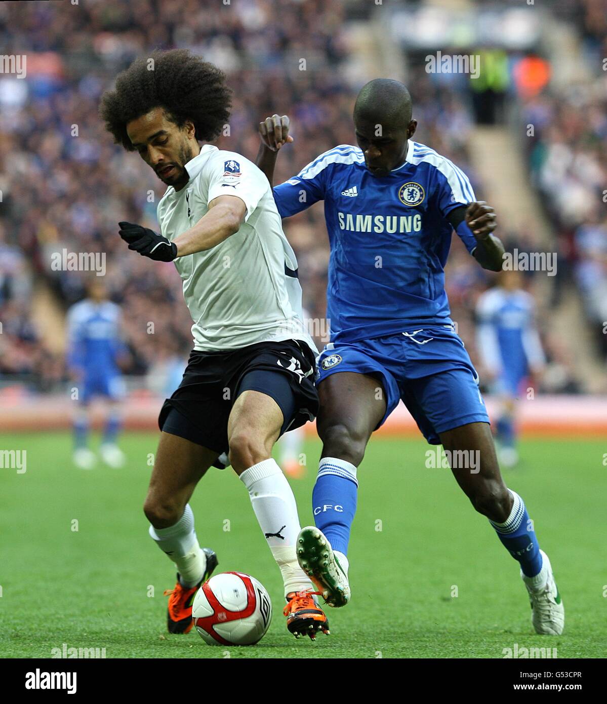Soccer - FA Cup - Semi Final - Tottenham Hotspur v Chelsea - Wembley Stadium. Chelsea's Ramires (right) and Tottenham Hotspur's Benoit Assou-Ekotto (left) battle for the ball Stock Photo