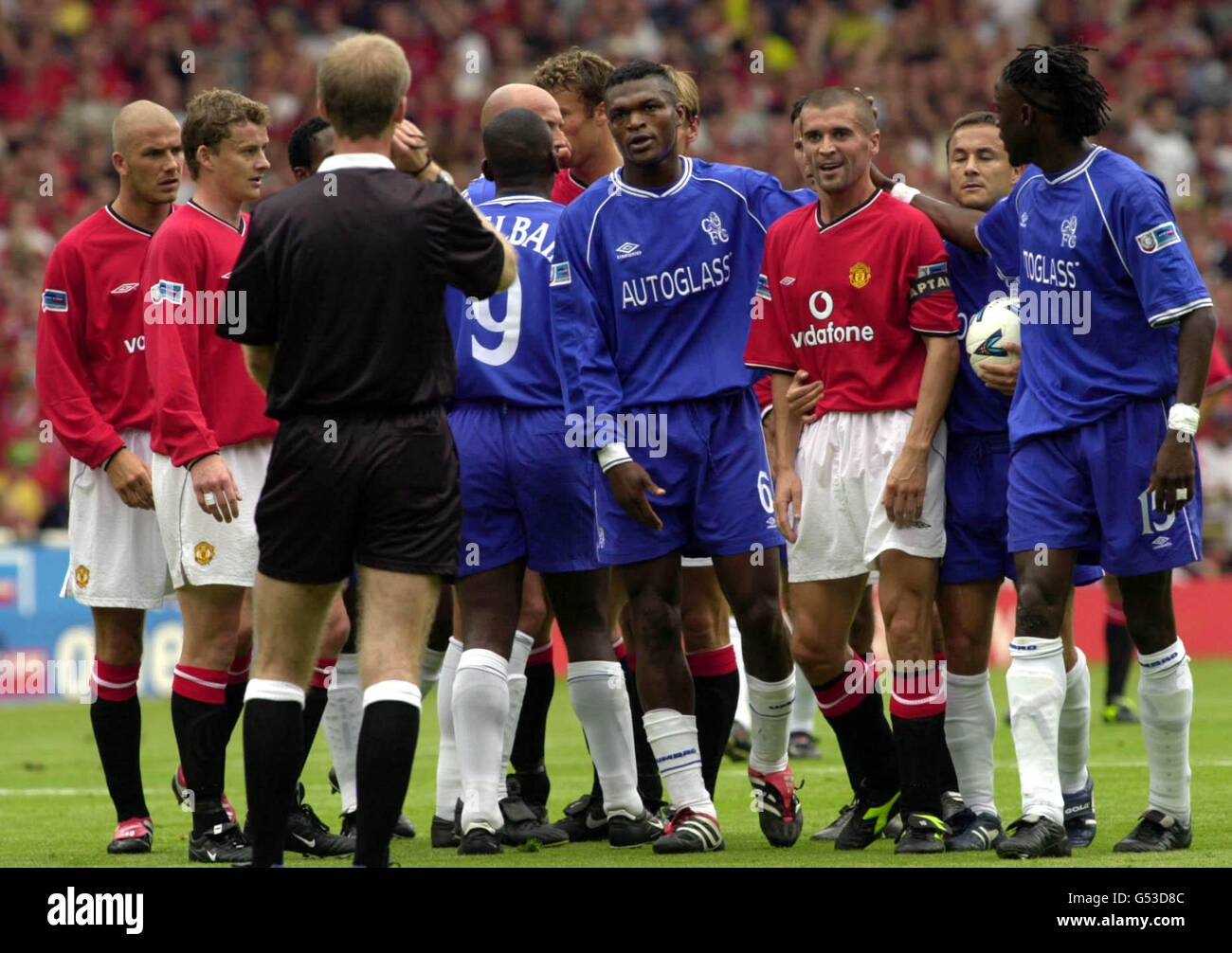 Chelsea and manchester united players with the referee hi-res stock ...