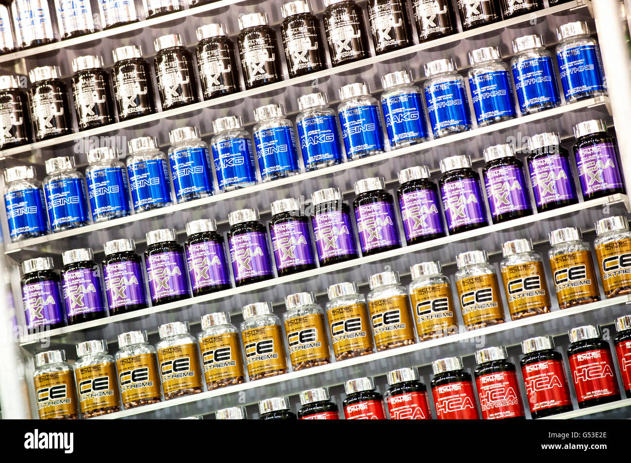 A shelf of nutritional supplements for muscle growth, bodybuilding, FIBO Power 2012 fitness fair, Essen, North Rhine-Westphalia Stock Photo