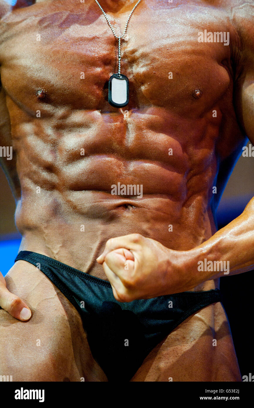Sixpack, abdominal muscles of a bodybuilder during a bodybuilding show, FIBO Power 2012 fitness fair, Essen Stock Photo