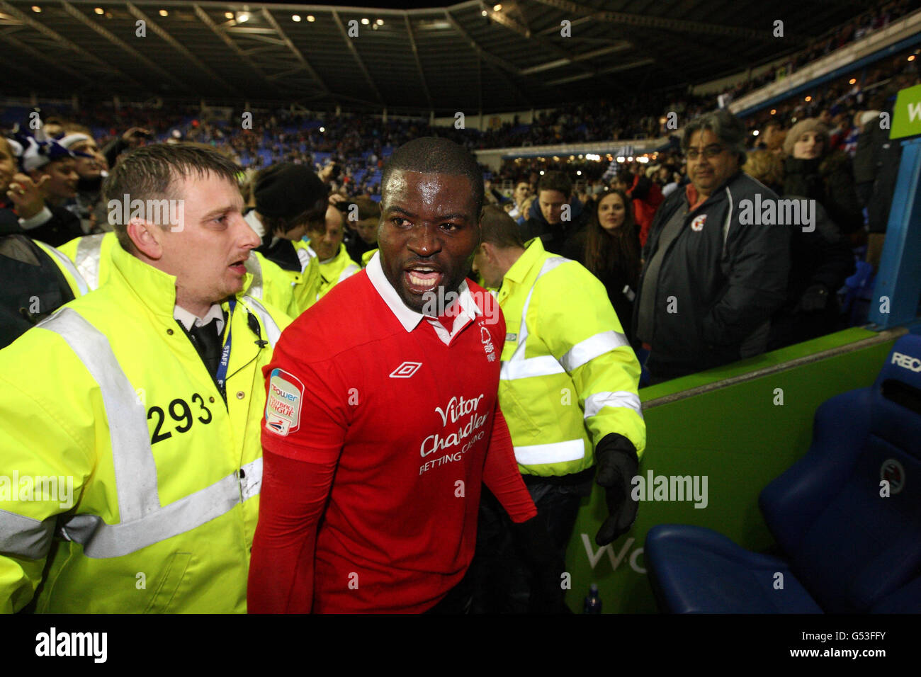 Nottingham Forest's George Elokobi reacts after pushing a reading ...