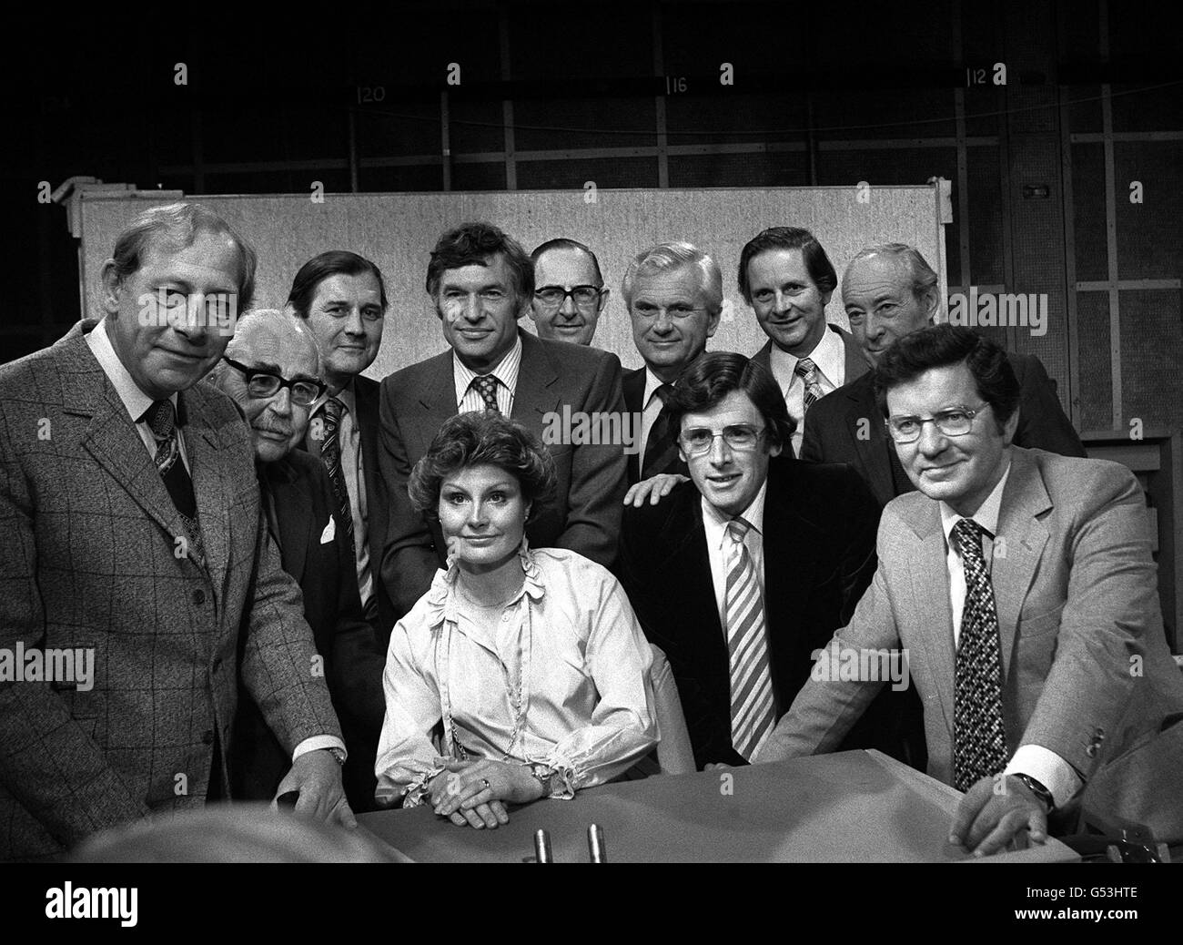 BBC TV newsreaders past and present at the BBC TV centre in London, where they celebrated 25 years of BBC TV News. L-R (standing): Peter Woods, John Snagge, Corbet Woodall, Bob Langley, Colin Doran, Kenneth Kenall, John Simpson and Robert Dougall. * L-R (seated) Angela Rippon, Richard Whitmore and Richard Baker (who will read the 25th Anniversary News at Nine - exactly 25 years after he read the first TV news bulletin). 13/10/00: The BBC evening news bulletin will move from 9pm to 10pm from October16th as part of BBC one's autumn's schedule. Stock Photo