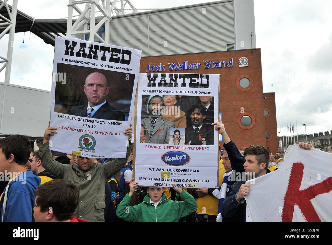 Blackburn Rovers fans take part in a protest march against the club's owners Venky's and manager Steve Kean before the match Stock Photo