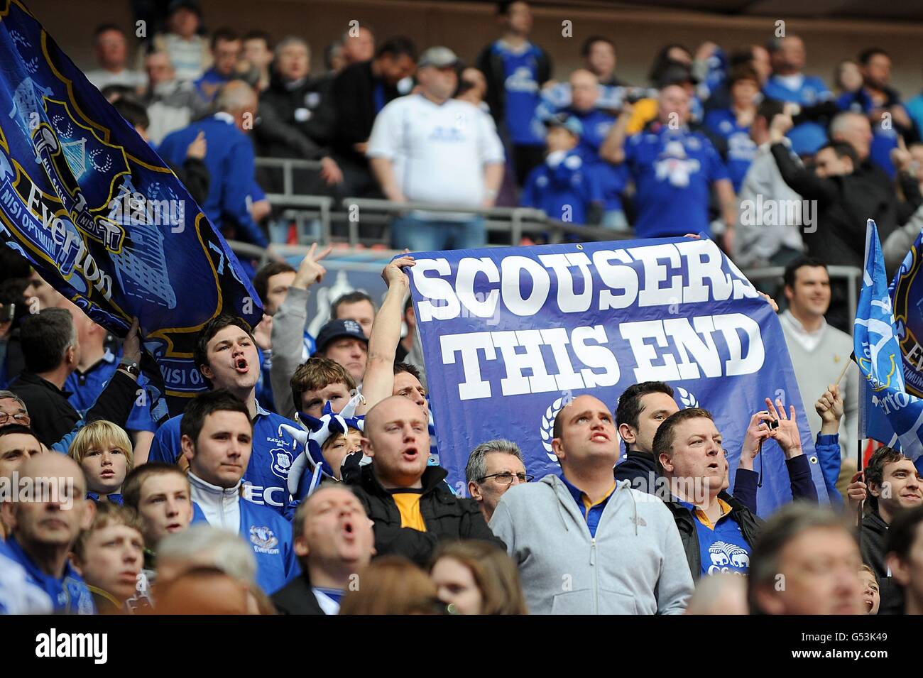 Soccer - FA Cup - Semi Final - Liverpool v Everton - Wembley Stadium. Everton fans hold a banner reading 'scousers this end', in the stands Stock Photo