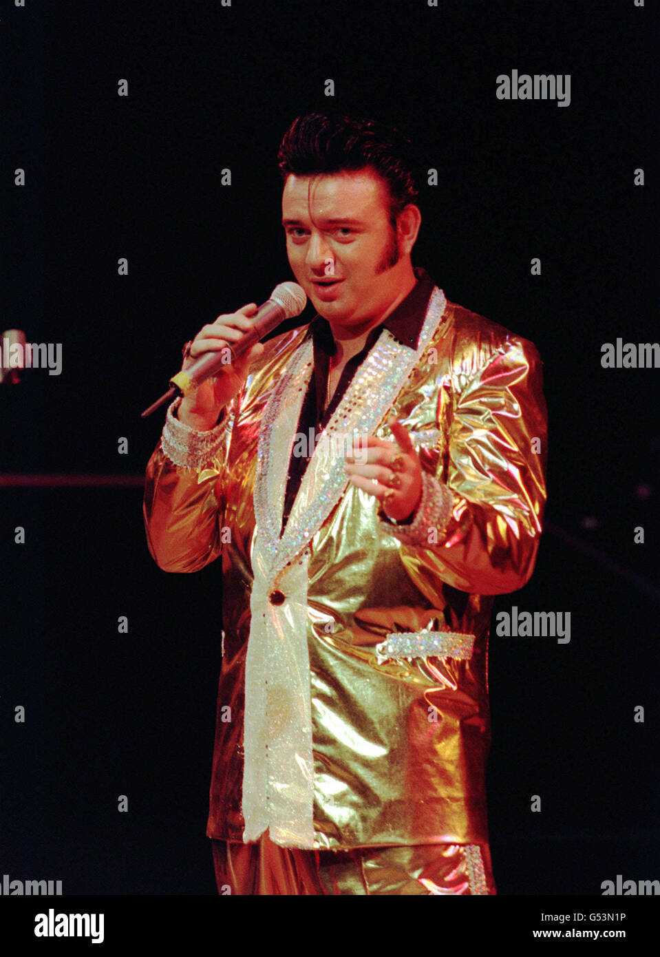 'Emerald Elvis', Irishman Mark Leen, who won the Elvis Presley lookalike contest held at the Hippodrome nightclub in Leicester Square, London. The winner will appear as a star guest on the tv shopping channel 'Ideal World'. Stock Photo