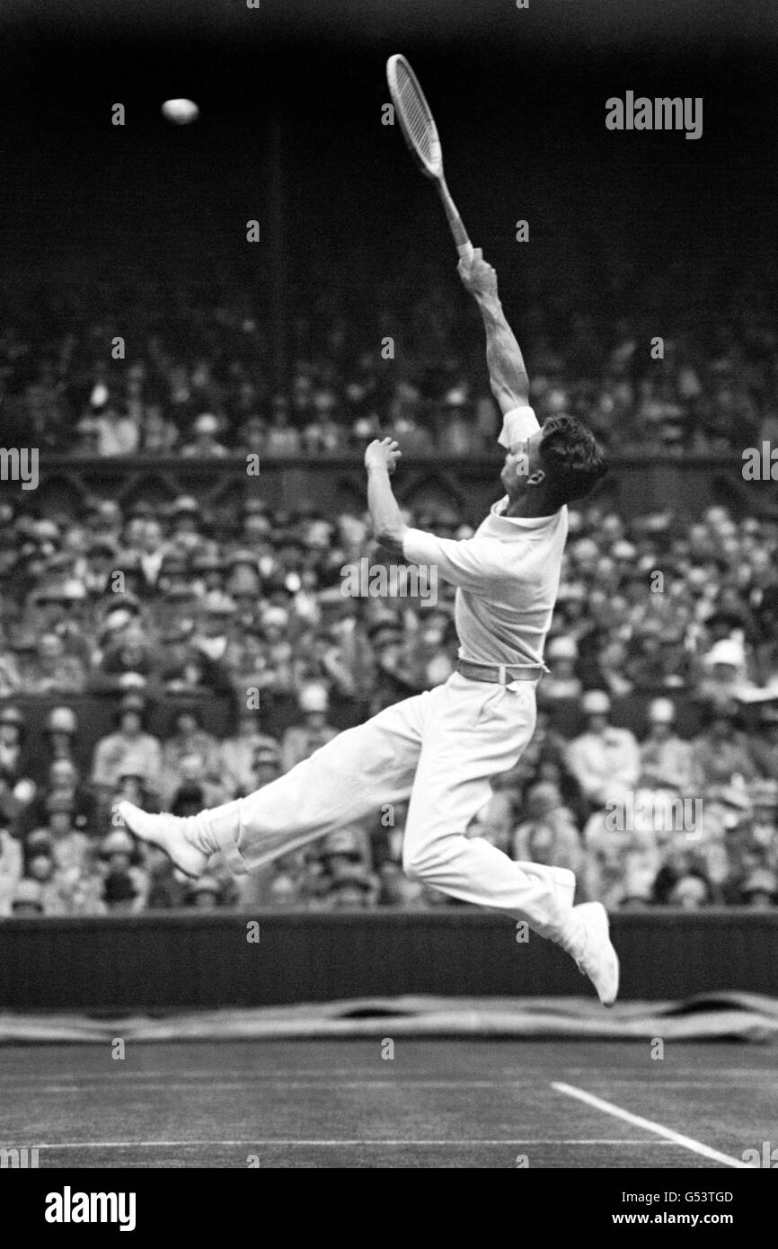 Henry 'Bunny' Austin in action during the Mens Singles. Austin was part of the golden age of British tennis, teaming up with Fred Perry to win four consecutive Davis Cup finals between 1933 and 1936. Austin was the last British man to reach the Men's Singles Final at Wimbledon, in 1938. Stock Photo