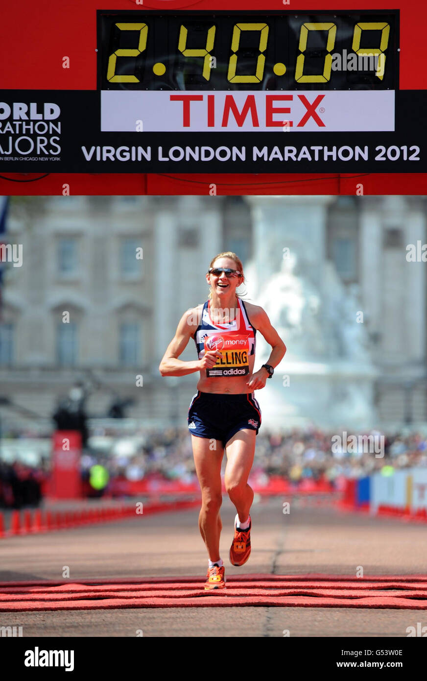 Athletics - 32nd Virgin London Marathon. Great Britian's Liz Yelling finishes the women's Elite race during the 32nd Virgin London Marathon in London. Stock Photo