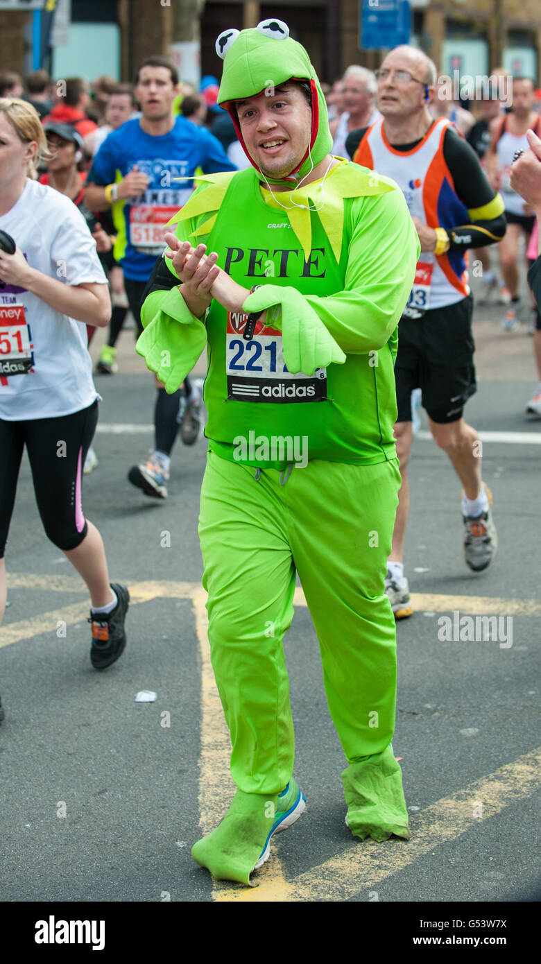 A runner in costume takes part in the 32nd Virgin London Marathon in London. Stock Photo