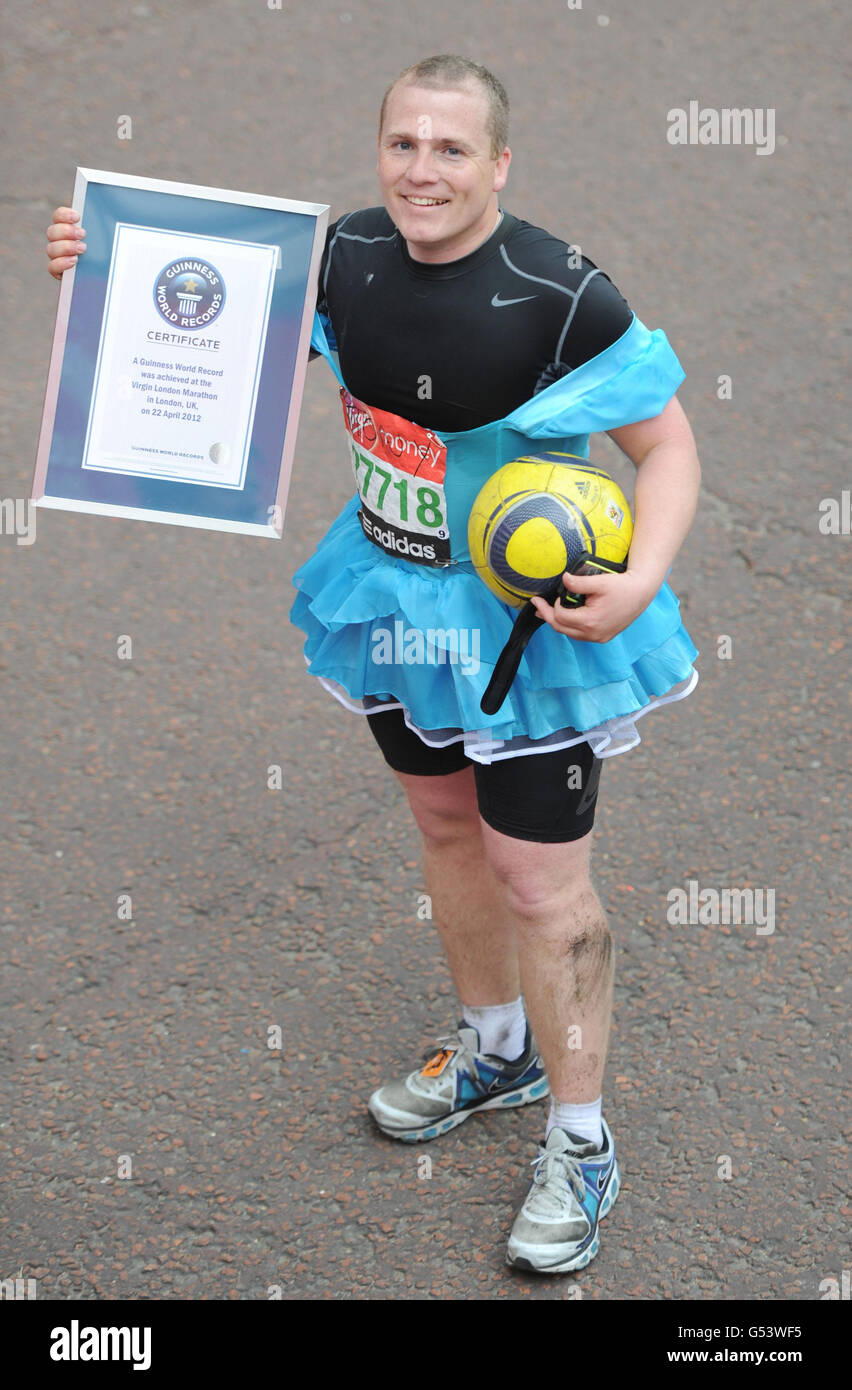 A runner achieves the world record for football keepups during the
