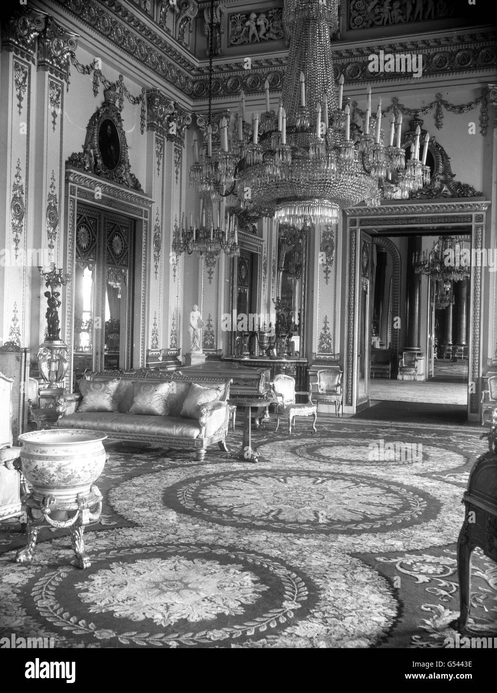 Buildings and Landmarks - White Drawing Room - Buckingham Palace, London. The White Drawing Room inside Buckingham Palace. The room is used for receptions and audiences. Stock Photo