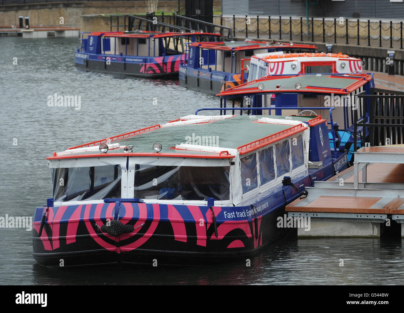 Olympic barges moored in the Limehouse Basin in east London today which will operate a ferry service to the Olympic Park from Limehouse and Tottenham Hale during the London 2012 Olympics. Stock Photo